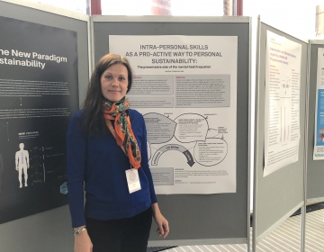 Emotion Revolution in Bergen, Norway 04/2018. Dr. Helena Lass with her poster. Photo: Ingvar Villido